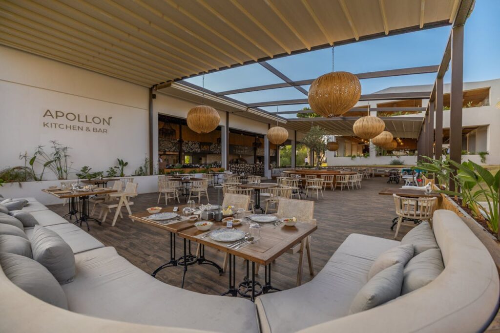 Experience elegant outdoor dining at Apollon Kitchen & Bar in Didim, Türkiye, with stylish decor and ambiance.
